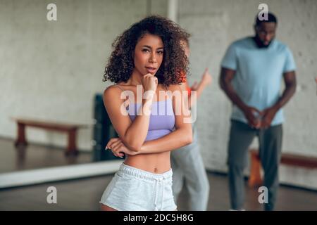 Thoughtful dancer is figuring out on a new choreography Stock Photo