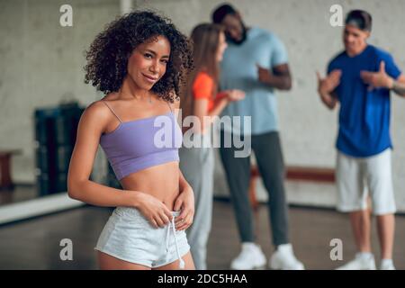 Beautiful young woman attending a dancing rehearsal Stock Photo