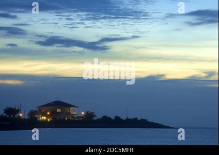 bunglow house during sunset standing on the manmade island in Port Dickson Malaysia Stock Photo