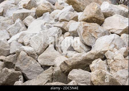 Big pieces of crumbled rocks and stone. For texture and background concepts. Stock Photo