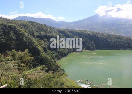 the beauty of Menjer Lake against the background of Mount Sindoro. tourist destination 'Hill of Love, Seroja Valley' Wonosobo, Central Java. Stock Photo