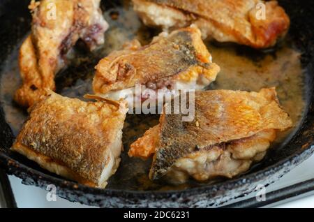 River fish fried in a frying pan Stock Photo - Alamy