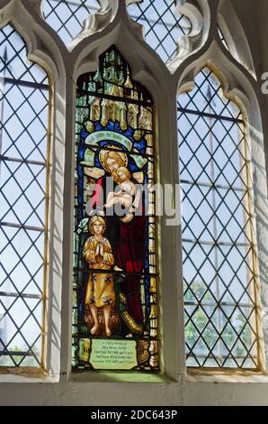 Stained glass window in the church of St Mary the Virgin, Higham Ferrers, Northamptonshire, UK Stock Photo