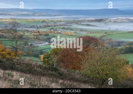 A view over Cwmcarvan towards the Black Mountains. Stock Photo