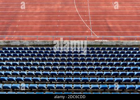 empty rows of seats in the auditorium of the athletic stadium Stock Photo