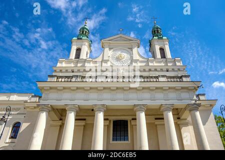 Lublin, Lubelskie / Poland - 2019/08/18: Facade of St. John the Baptist Cathedral - archikatedra Sw. Jana Chrzciciela - in historic old town quarter Stock Photo