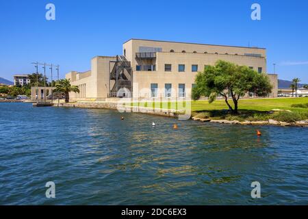 Olbia, Sardinia / Italy - 2019/07/21: Panoramic view of the Archeological Museum of Olbia - Museo Archeologico - on Gulf of Olbia island at the port a Stock Photo