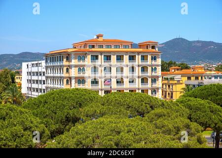 Olbia, Sardinia / Italy - 2019/07/21: Panoramic view of Olbia port area and Grand Hotel President with Cabu Abbas hills in background Stock Photo