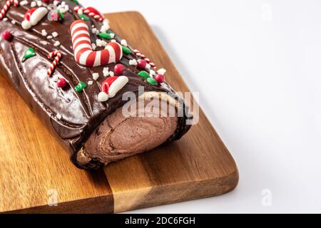 Chocolate yule log christmas cake isolated on white background Stock Photo