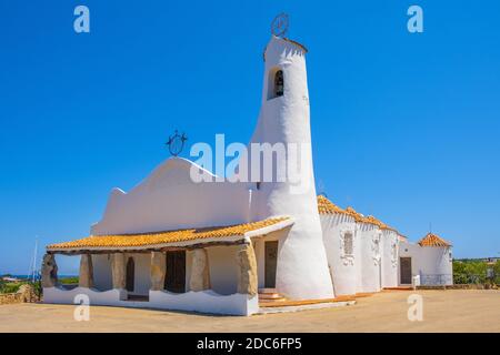 Porto Cervo, Sardinia / Italy - 2019/07/20: Chiesa Stella Maris church overlooking port and residences of Porto Cervo resort at the Costa Smeralda coa Stock Photo