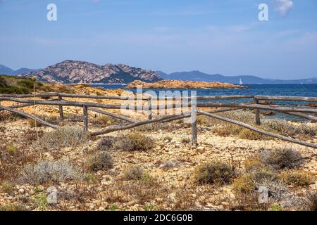 Panoramic view of Spalmatore di Terra peninsula of Marine Protected Area natural reserve with Mediterranean scrub of Isola Tavolara island on Tyrrheni Stock Photo