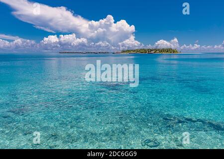 Aerial view of Maldives atolls is the world top beauty. Maldives tourism. Maldives island vacation paradise sea view, coral reefs and atolls. Luxury Stock Photo