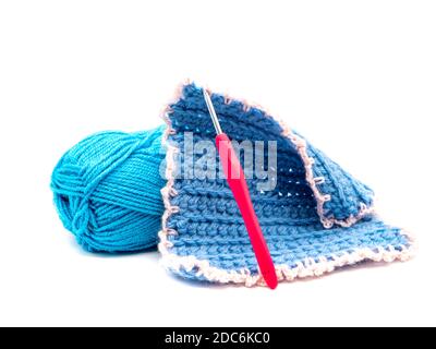 Pot holder with crochet hook and wool isolated on white background Stock Photo