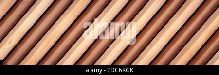 Extra wide wallpaper. Diagonal slats of natural wood and elegant metal. Stock Photo