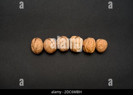 walnuts on a black background, macro Stock Photo