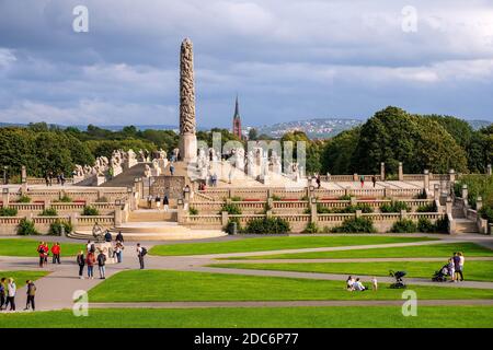 Oslo, Ostlandet / Norway - 2019/08/30: Panoramic view of The Monolith sculpture, Monolitten, in Vigeland Park open air art exhibition - Vigelandsparke Stock Photo