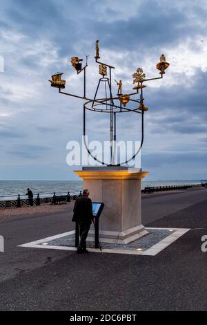 A Man Looks At The Information Below The Art Installation ‘Constellation’  On Hove Seafront, Hove, Susssex, UK. Stock Photo