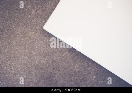 A high angle shot of a blank sheet on a rough surface Stock Photo