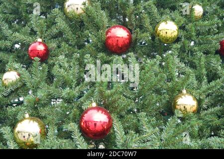 christmas tree with multi-colored balls and decorations background Stock Photo