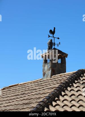 Windvane. Frailes, Sierra Sur, Jaen, Andalusia Spain. Image from the streets of the village renowned for its healing waters.Weathervane.Weathercock. Stock Photo