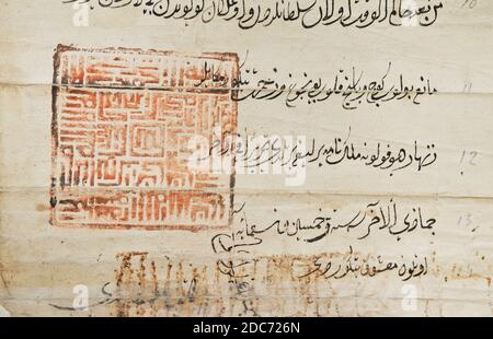 Handwritten document in Arabic script of the 15th-16th centuries with a square seal of the Crimean Khan. Stock Photo