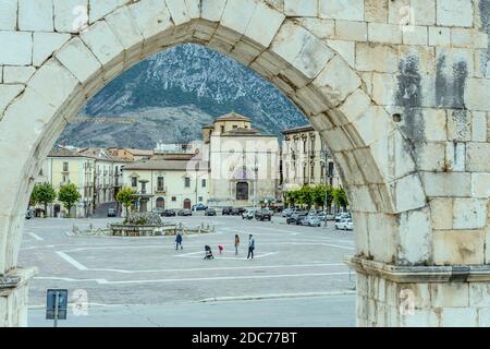 SULMONA, ITALY - september 27 2020: cityscape with S.Filippo Neri church view through monumental arch of medieval Swabian acqueduct at historical town Stock Photo