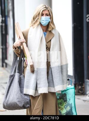 Kate Garraway arrives at the Global Radio Studios in London wearing a facemask. Stock Photo