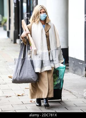 Kate Garraway arrives at the Global Radio Studios in London wearing a facemask. Stock Photo