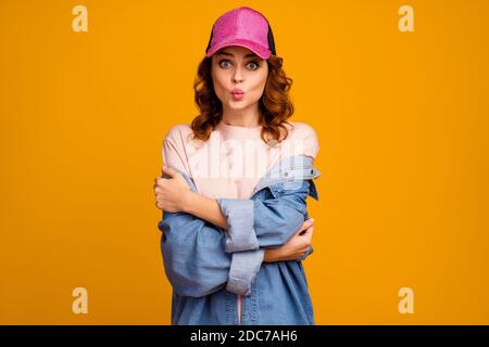 Portrait of her she nice-looking attractive lovely lovable charming cheerful girl hugging herself sending air kiss isolated on bright vivid shine Stock Photo