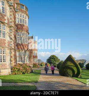 families enjoying the bright autumn sunshine on a very cold day in East Yorkshire, uk, gb Stock Photo