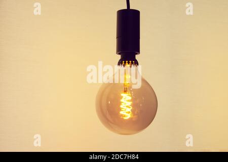 Round shape spiral diode lamp in vintage style for interior Stock Photo