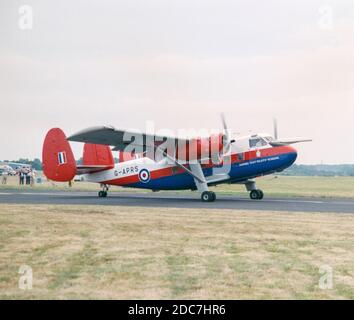 A 1959 Scottish Aviation Twin Pioneer aircraft, registration G-APRS, in the colours of the Empire Test Pilots School taxying for take off at an airport in England in 2003. Stock Photo