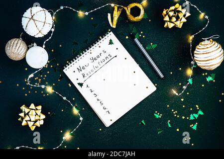 New Year's goals. the list of resolutions in a notepad. Resolution Aspirations Motivation Concept Stock Photo