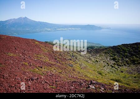 Panoramic view of Llanquihue Lake from crater on slopes of Osorno Volcano located in Los Lagos region in Chilean Andes. Chile Stock Photo