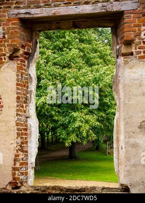 Tree viewed through window in the ruins of Houghton House a mansion near Ampthill in Bedfordshire England UK Stock Photo