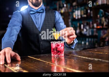 Barman makes a cocktail at the taproom Stock Photo
