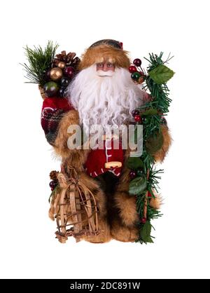 Santa Claus doll isolated on white background. Christmas decoration. Stock Photo