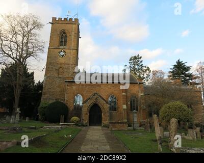 The old stone Church of St Peter & St Paul has been serving the Abington community since the 12th century and is known as 'the church in the park'. Stock Photo