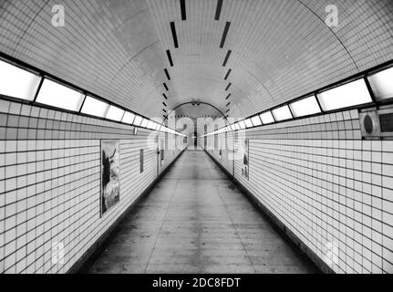 underground commuter subway train tunnel in the city Stock Photo