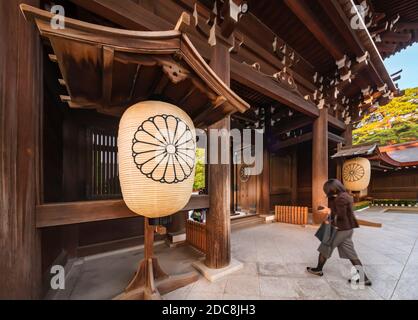 shibuya, japan - november 02 2019: Rōmon minami-shinmon wooden gate with two giants paper lanterns adorned by imperial kikkamon coat of arms depicting