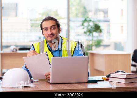 Young architect working in the office Stock Photo