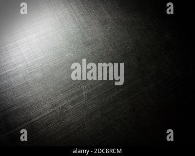 corrugated metal alloy as a background, metal surface, aluminum alloy, magnesium alloy, sun flare, grainy texture Stock Photo