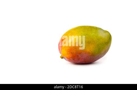 Fruit background with ripe mango on white background. Stock Photo