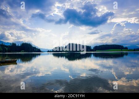 Mirroring and reflections on the water surface in a variety of colors Stock Photo