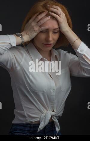 ginger young woman with freckles Stock Photo