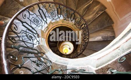 historic winding staircase steps in spiral shape form low angle view Stock Photo