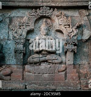 Close Up Photo of Detail of the Stone Bas Relief Carvings that Line the Walls of Borobudur Temple, Yogyakarta, Java, Indonesia, Asia Stock Photo