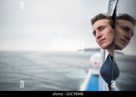 Tourist on the boat from Banda Aceh to Pulau Weh Island, Aceh Province, Sumatra, Indonesia, Asia Stock Photo