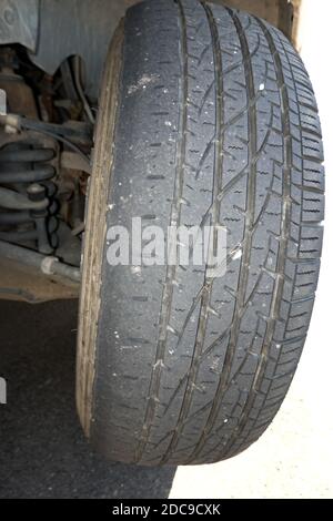 Tires worn on one side on a car with negative camber Stock Photo - Alamy