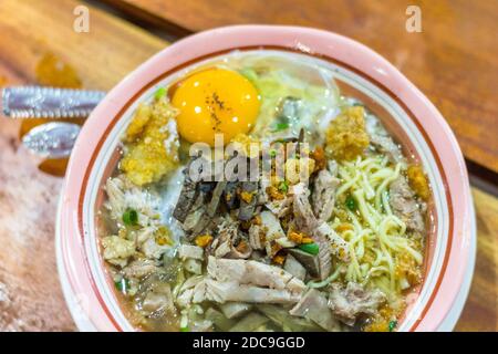 A bowl of a regional noodle dish called pansit batchoy at a local noodle house in Iloilo City, Philippines Stock Photo